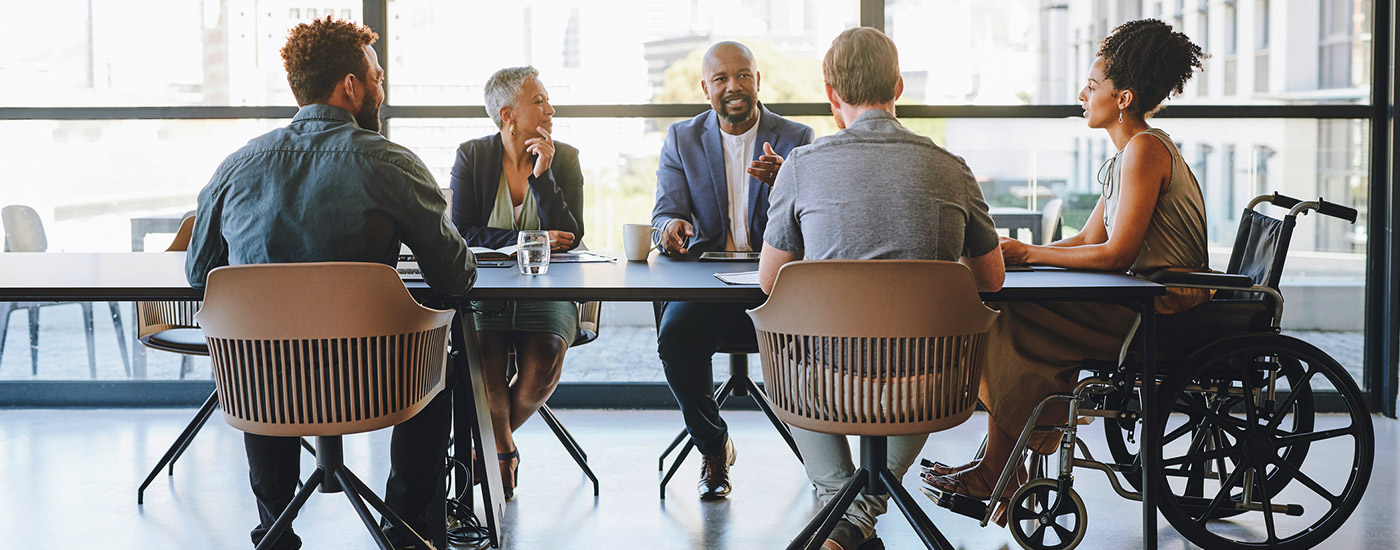 group of employees meeting in the office